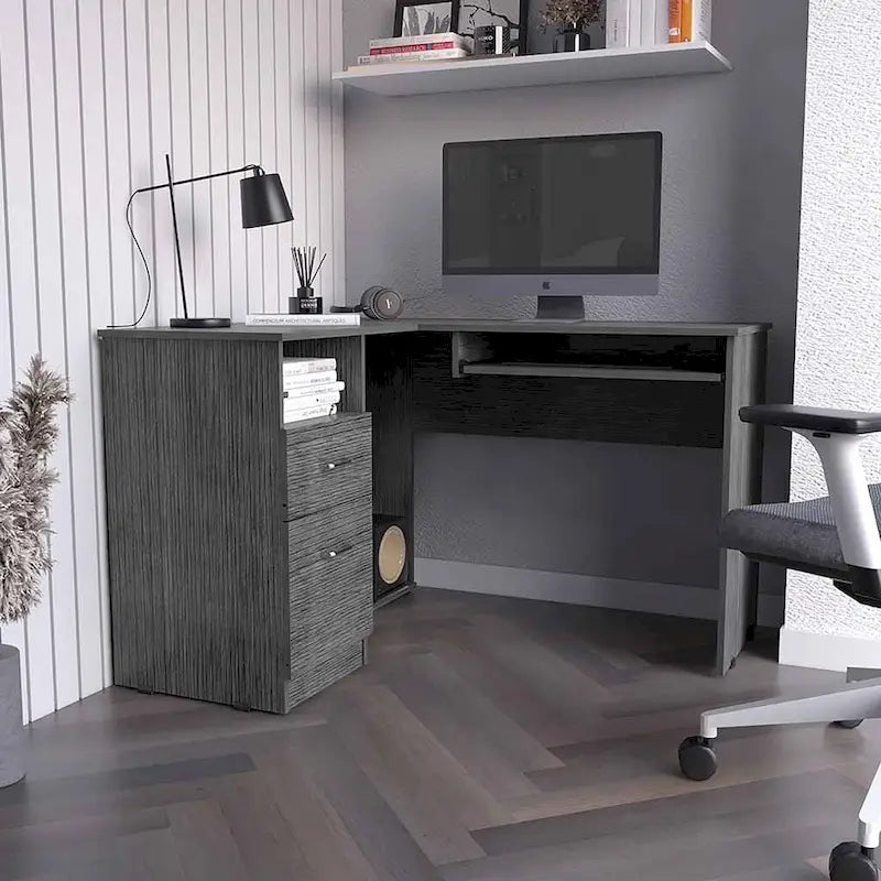 L-shaped desk with a keyboard tray, finished in a smoked oak color; high-quality, sturdy, and durable.