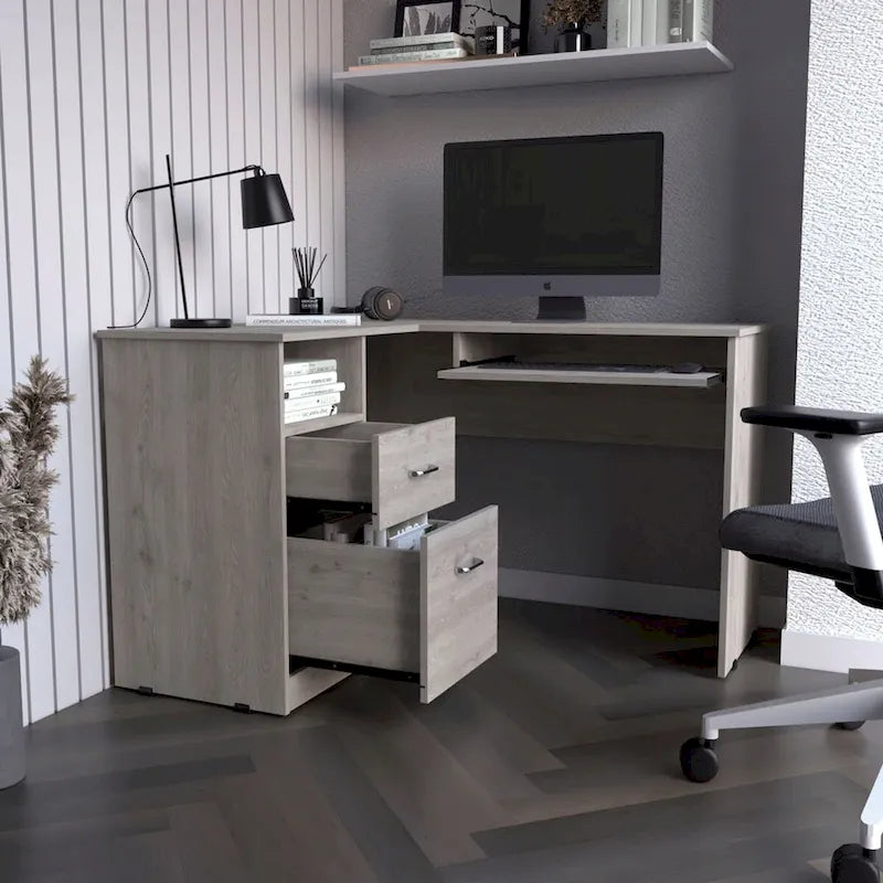 L-shaped desk with a keyboard tray, finished in a smoked oak color; high-quality, sturdy, and durable.