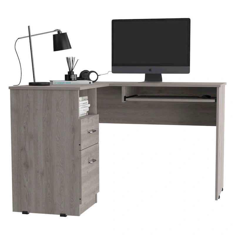 L-shaped desk with a keyboard tray, finished in a smoked oak color; high-quality, sturdy, and durable.